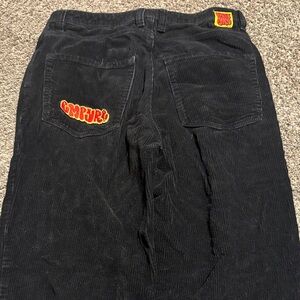 Baggy Empyre Black Corduroy jeans with Red and Yellow Accents